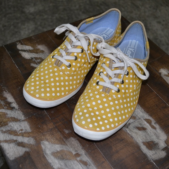 yellow and white polka dot shoes
